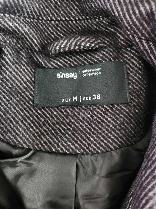 Чисто ново палто