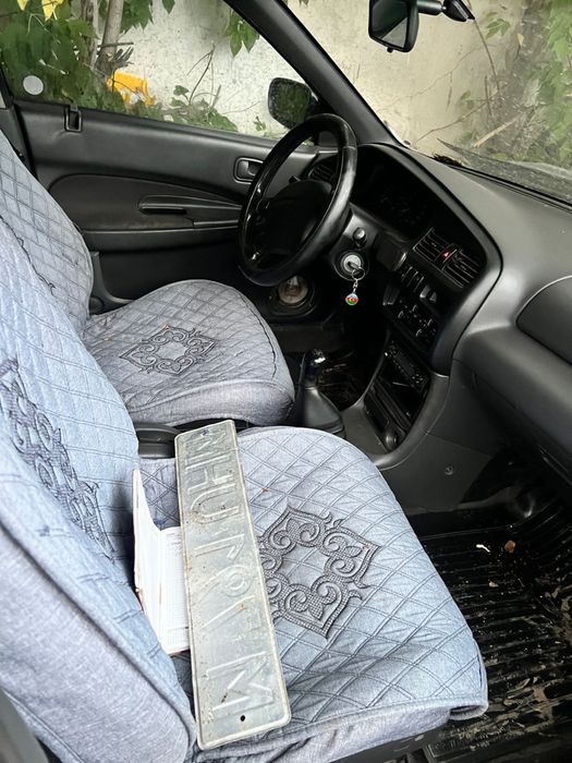 Мазда 323 в аварийном состоянии