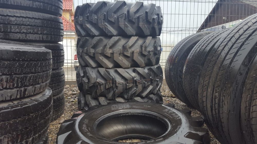 Cauciucuri NOI 12.5/80-18 pentru buldoexcavator in fata cu tva inclus