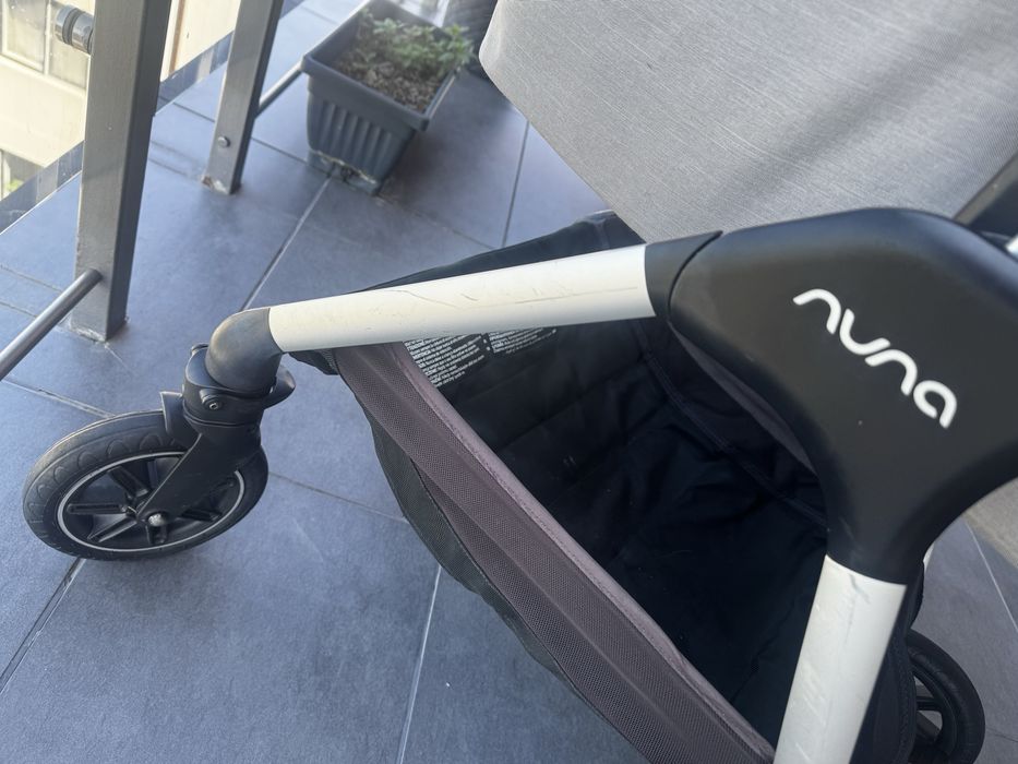 Nuna Triv + Landou + Scoică ARRA Next + Bază Isofix Next + Accesorii – Sistem complet 3 în 1