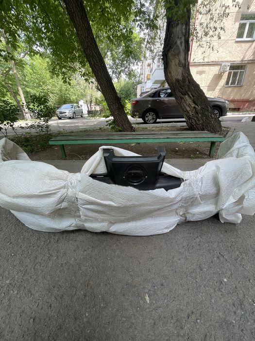 Передний бампер Nissan Tiida