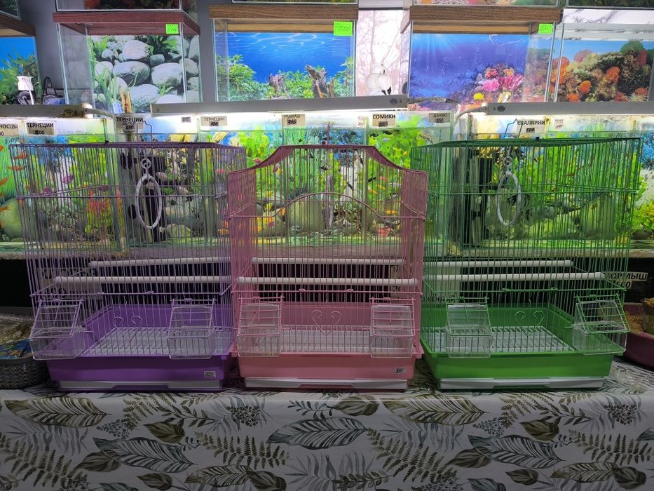 Клеточки для попугаев