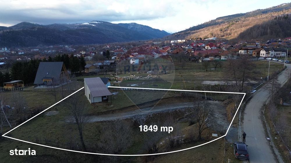 Teren de vanzare in Leresti si casa la roșu cu vedere spre Iezer