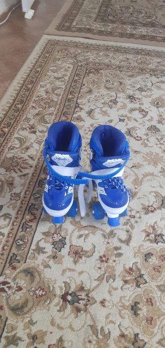 Продам роликовые коньки