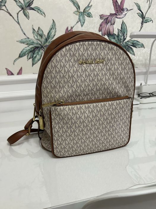 Рюкзаки и сумки в