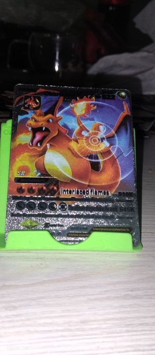 Charizard , holati yaxshi narxi 20 000 ming som