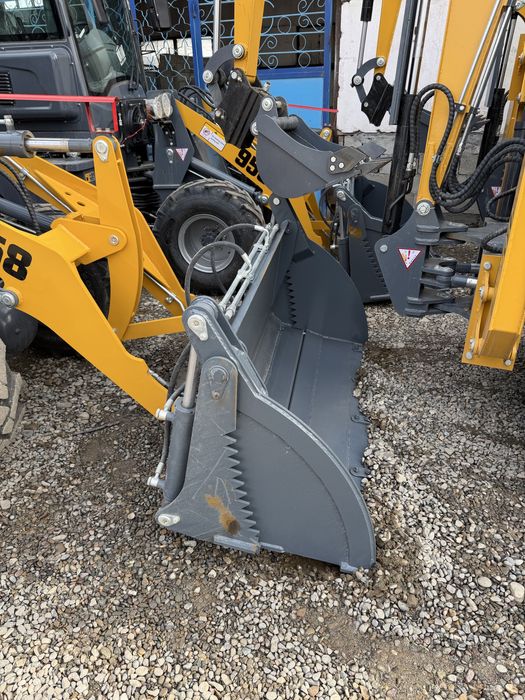 Экскаватор погрузчик 2026