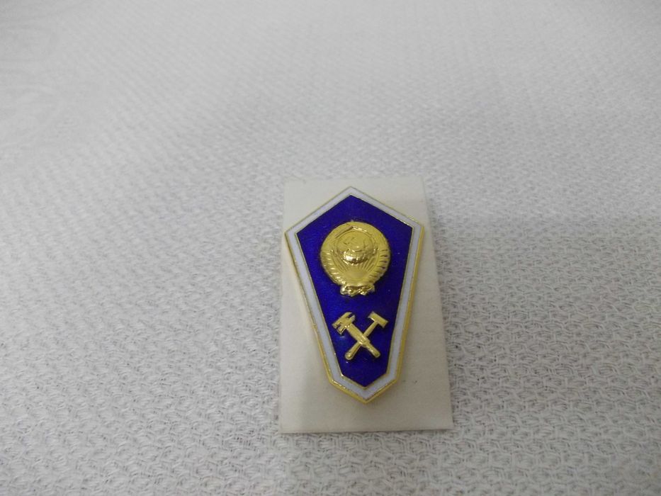 Знаки - ромбы о высших образованиях.