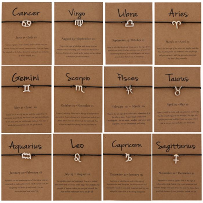 Регулируема гривна с черна връв със зодиите в златисто и сребристо