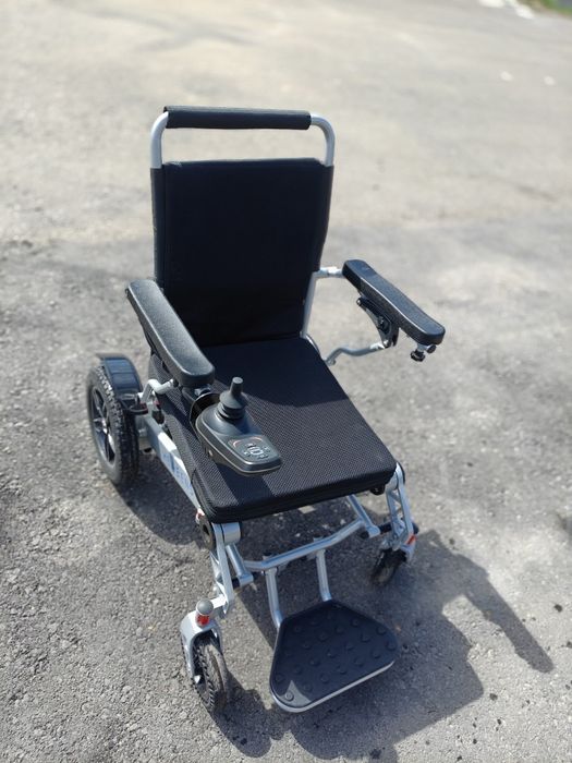 Нвалидная коляска с электроприводом.