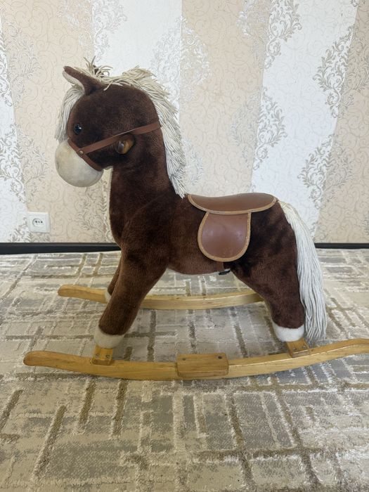 Игрушечная лошадка кочалка