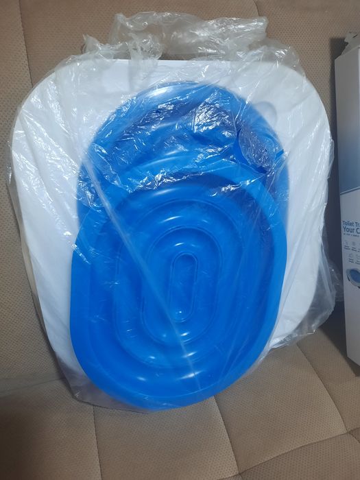 Система для приучения для котов к унитазу.