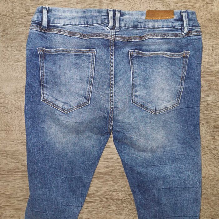 Накъсани дънки Zara