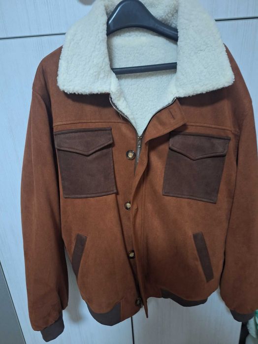 Продавам мъжко яке,чисто ново