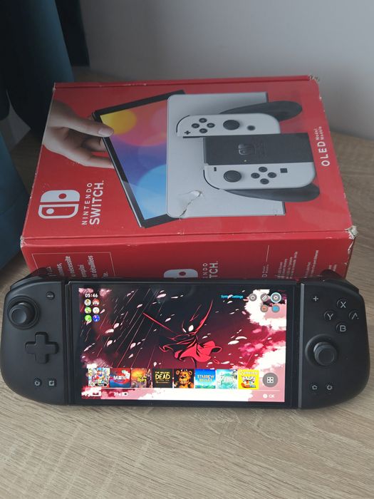 Nintendo Switch OLED Modat 512 gb + 74 Jocuri + Mobapad M6 HD – Stare excelentă