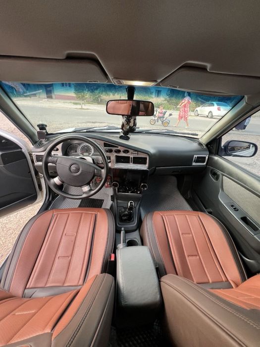 Nexia 2  1.6 люкс кондиционер