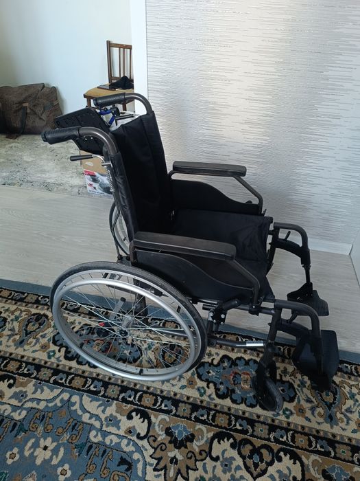 Инвалидная коляска новая