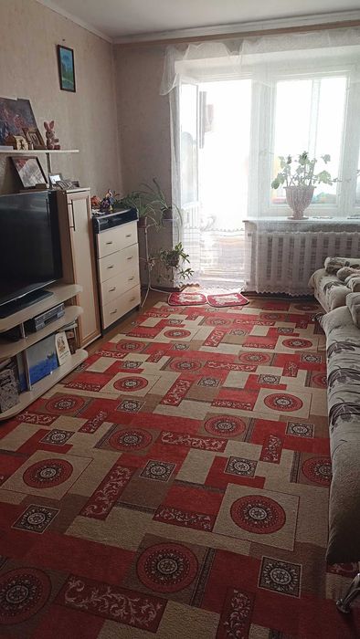 Продам 4-комнатную квартиру