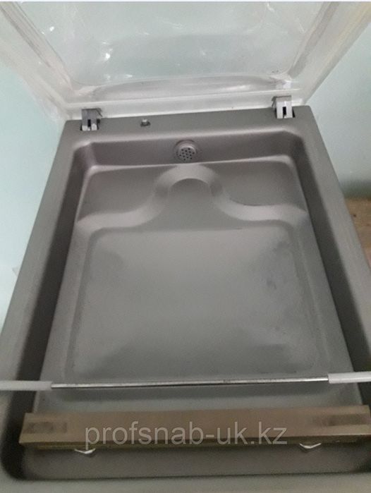 Вакуумный упаковщик.