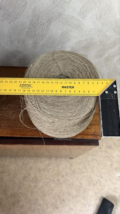 Бобина с ниткой