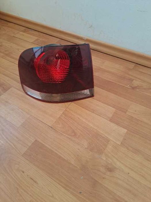 Stop stanga VW Touareg original fumuriu