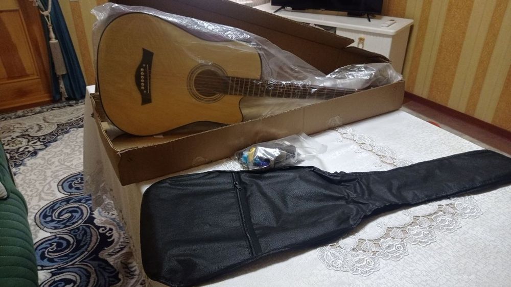 Gitara yengi olib lekin ishlatmaganman