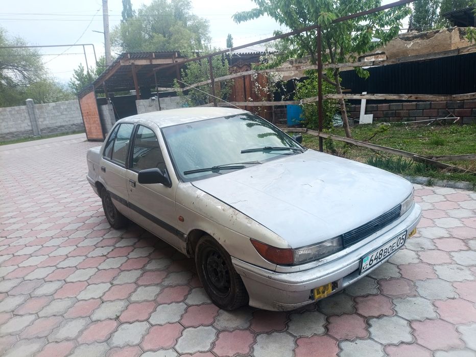 Митсубиси Лансер 6