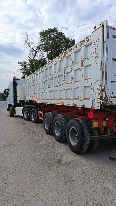 HOWO A7 тягач + самосвал полуприцеп сотилади