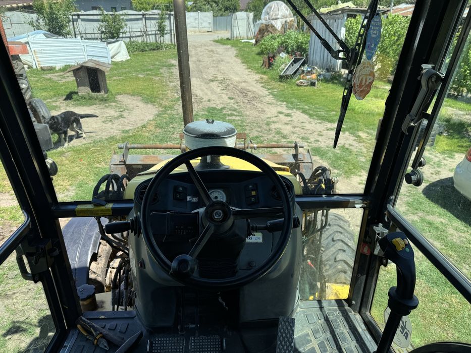 Buldoexcavator New Holland LB110