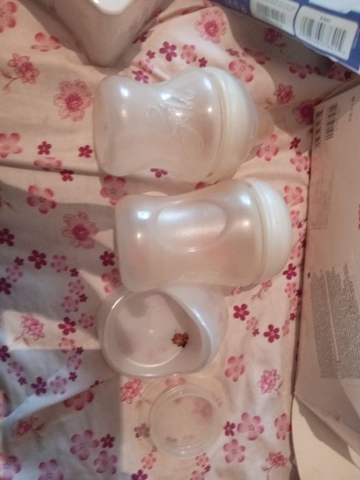 Набор молокоотсос, бутылочки.