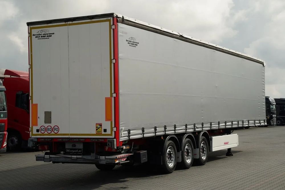 Fruehauf / SEMIREMORCĂ CU PRELATĂ (CURTAINSIDER) / TRANSPORT PALETI / PLATFORMĂ HIDRAULICĂ DHOLLANDIA - 2.000 KG / PODEA REZISTENTĂ (HEAVY-DUTY) / AXĂ LIFTABILĂ / AXE SAF /