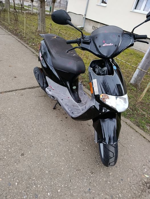 Vând scuter  super bun