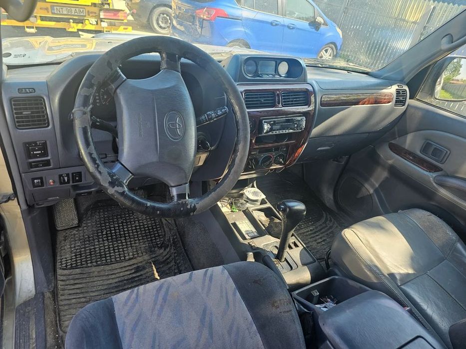 dezmembrez toyota land cruiser j90 163cp an 2002 volan stanga