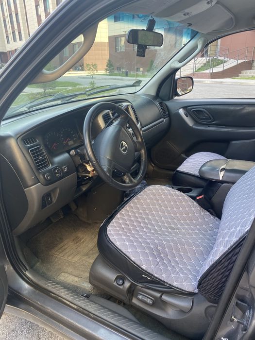 Мазда Трибют