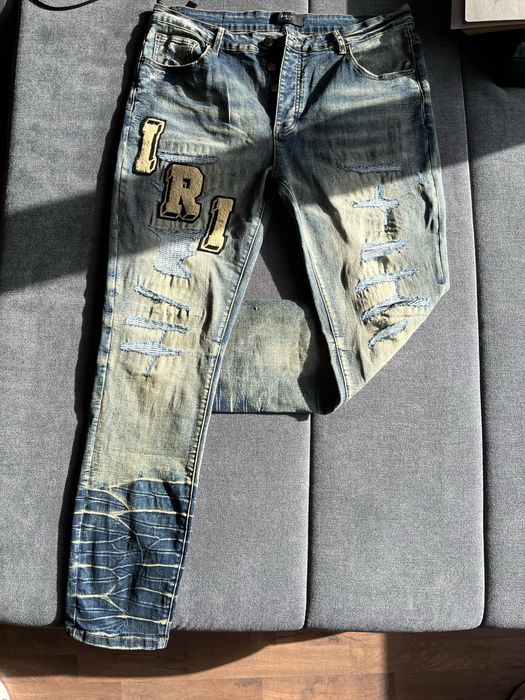 AMIRI :Varsity ripped jeans(УНИВЕРСАЛНИ)