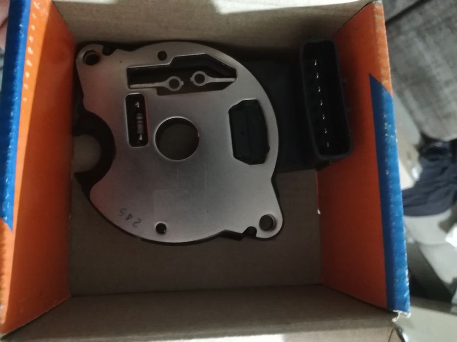 Датчик хола на Мазду 323 96 года