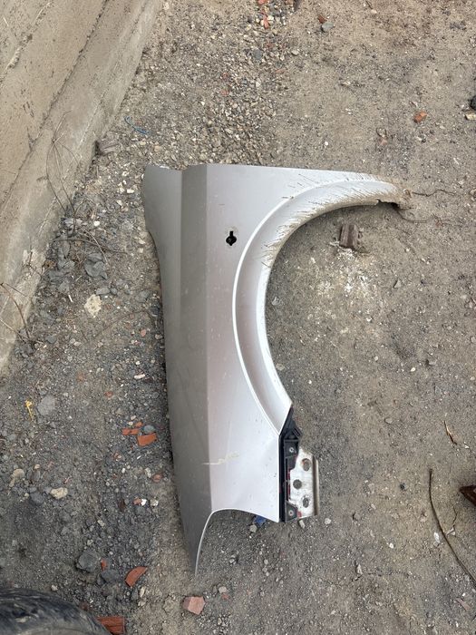 крыло левое Астра G