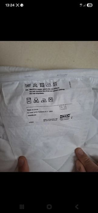 Cearceaf cu apărători la pătuț..