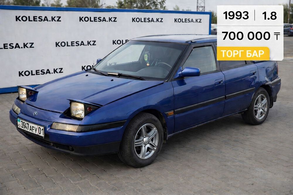 Мазда 323 F машина автомабиль