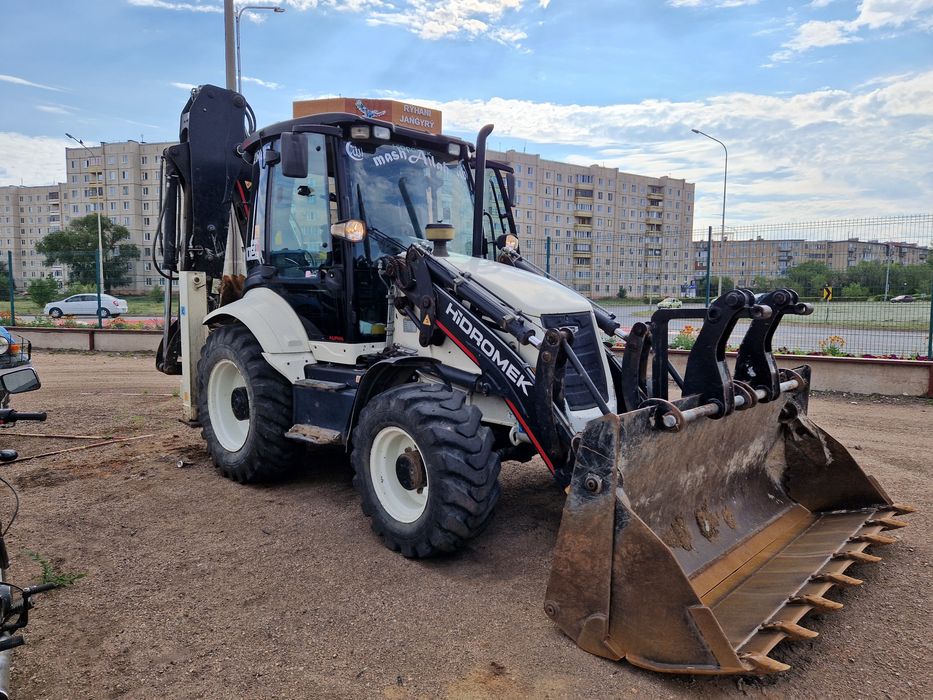 Услуги экскаватора погрузчика