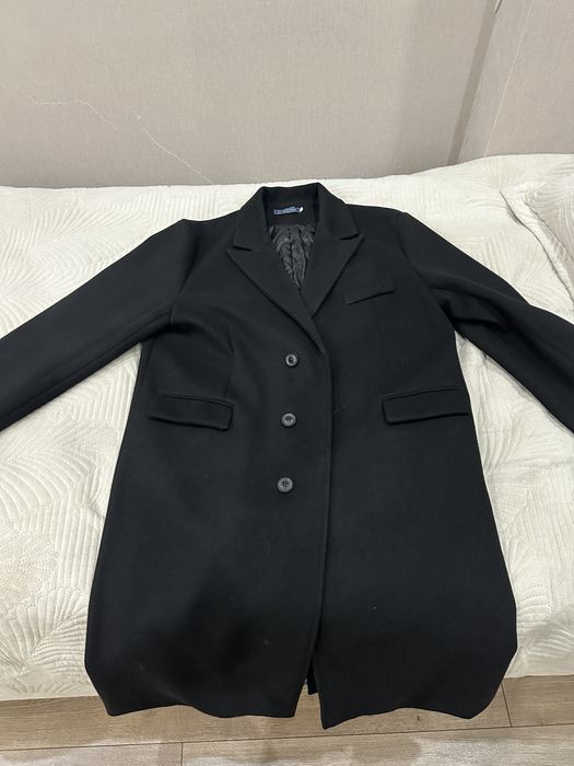 Неношенное новое пальто