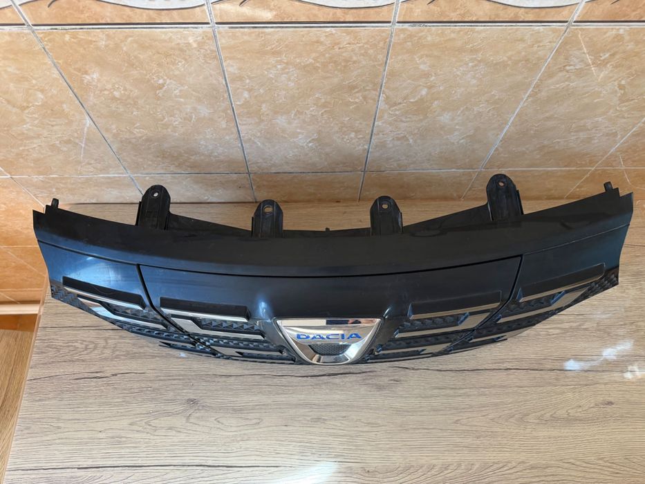 Grila bara fata radiator Dacia Spring originala ca noua - Cod OE 623105273R