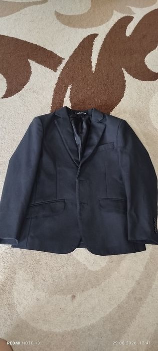 Продам школьный костюм