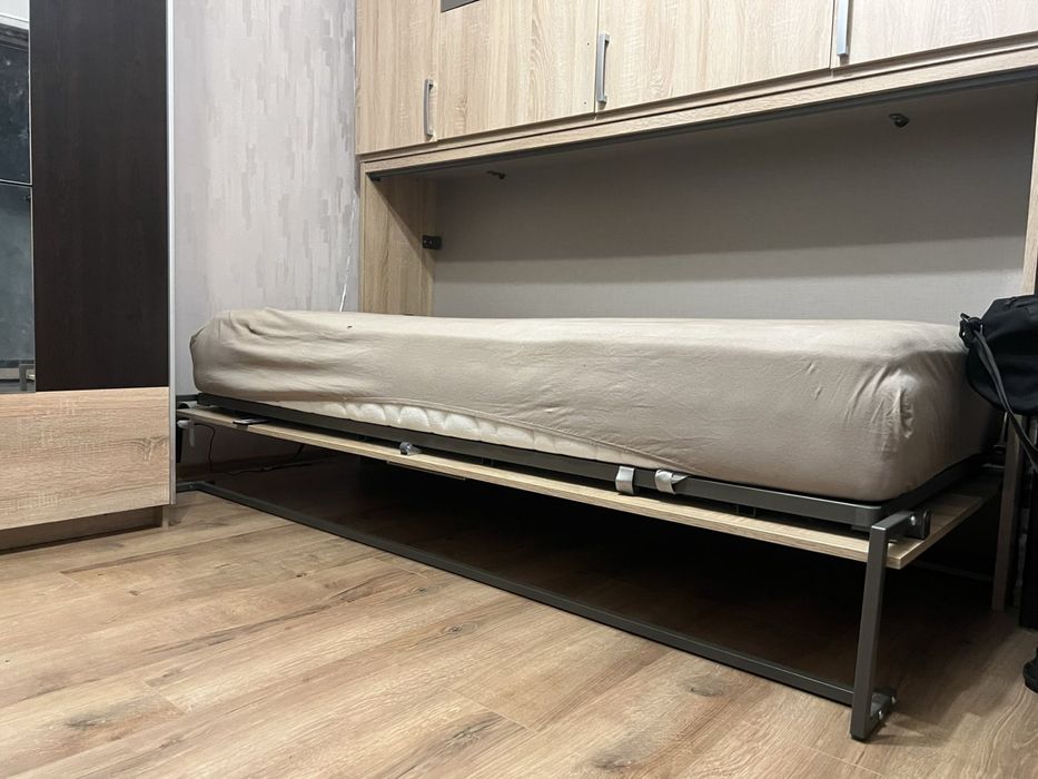 Легло с повдигащ се механизъм