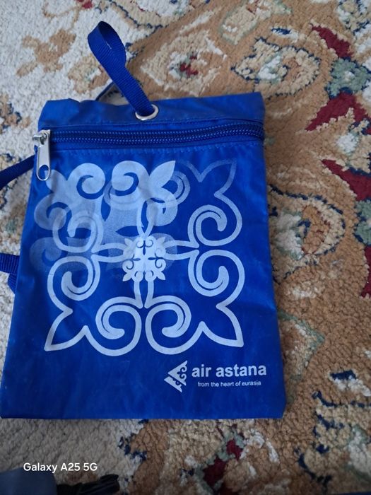 Сумочки с этно рисунком с застёжкой.