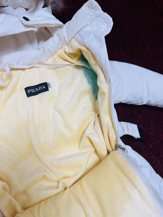 Продам зимний комбинезон Prada
