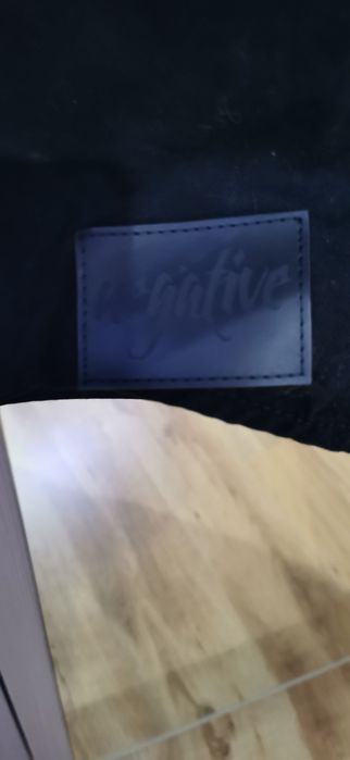 Елек на марката Negative