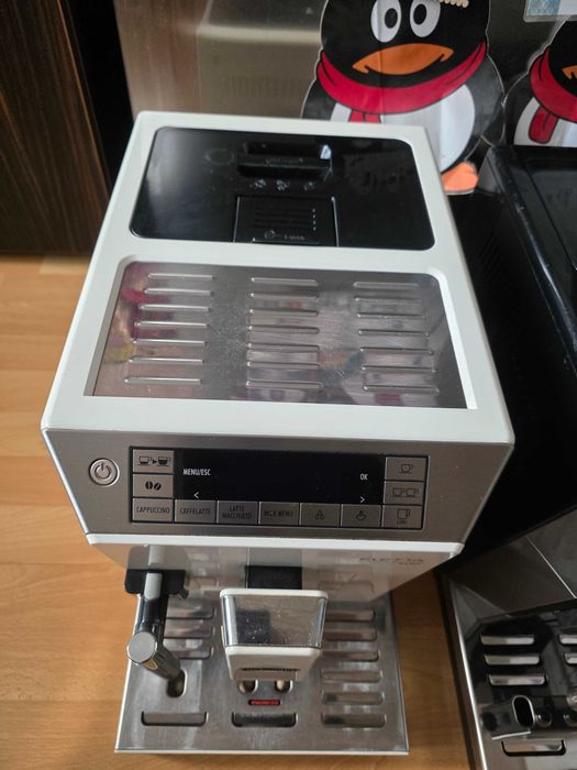 Кафемашина - Delonghi Eletta Cappuccino цената е за двете
