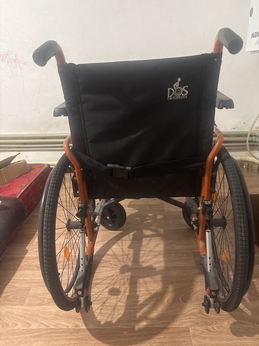 Инвалидная кресло