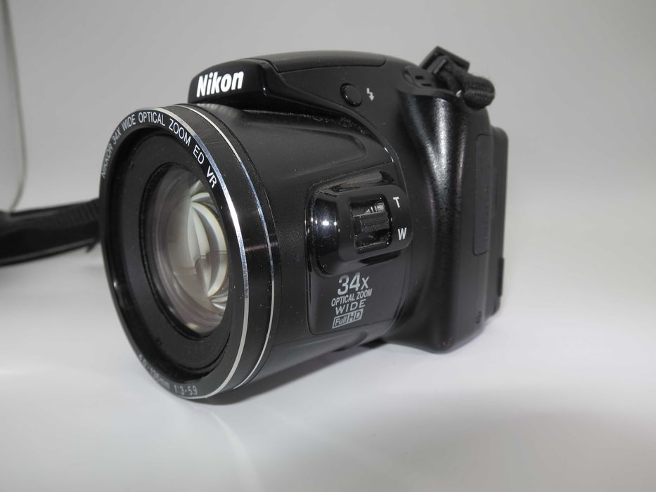 Nikon Coolpix L830 компактен цифров фотоапарат с огромен 34х оптичен зуум, дигитална камера Full-HD видео клип, и флип екран, като НОВА, рабои отлично